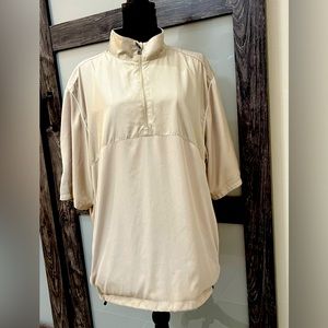 Greg Norman  vented lined khaki, short sleeve golf wind shirt size Large.